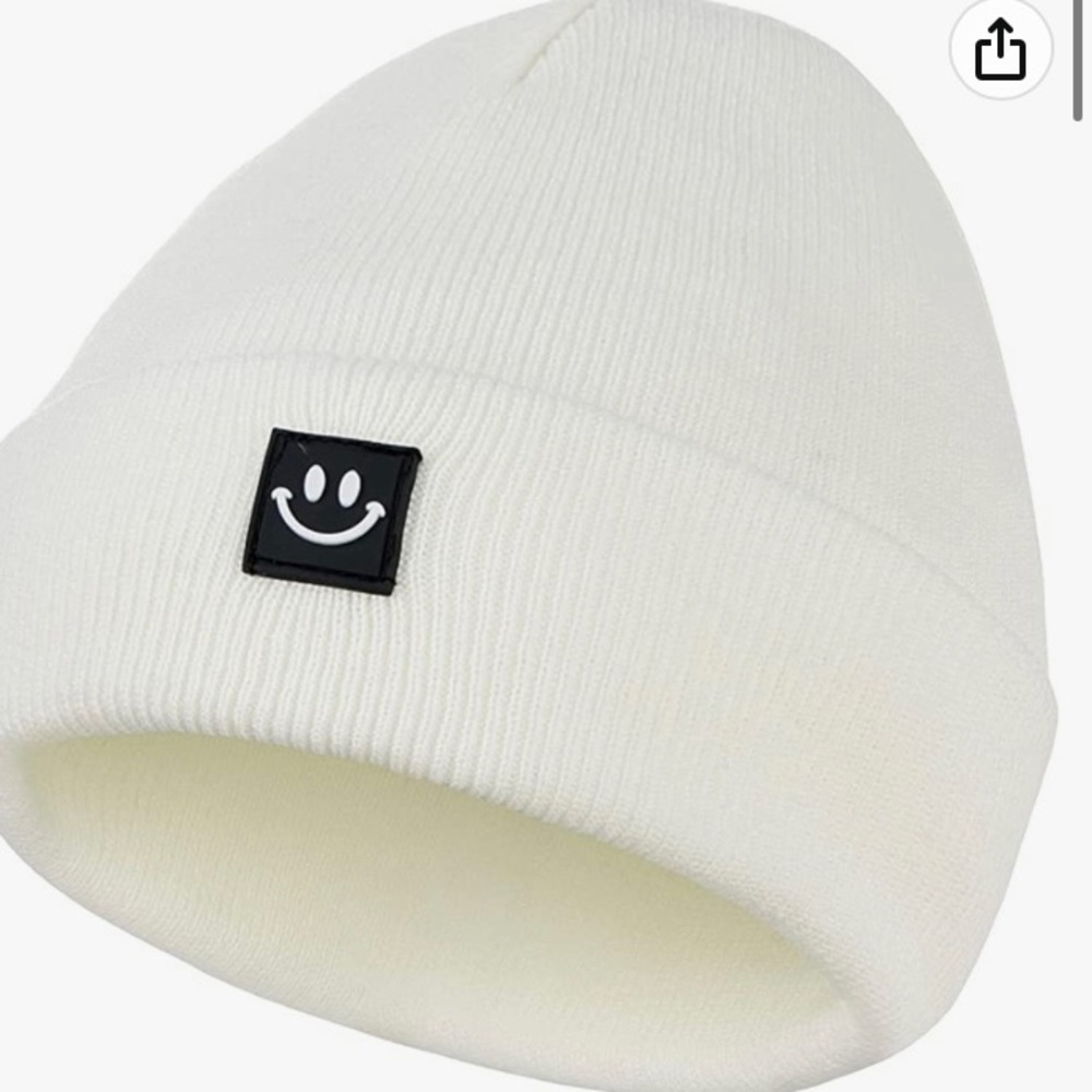 Beanie with hand embroidered smiley face in multiple colors